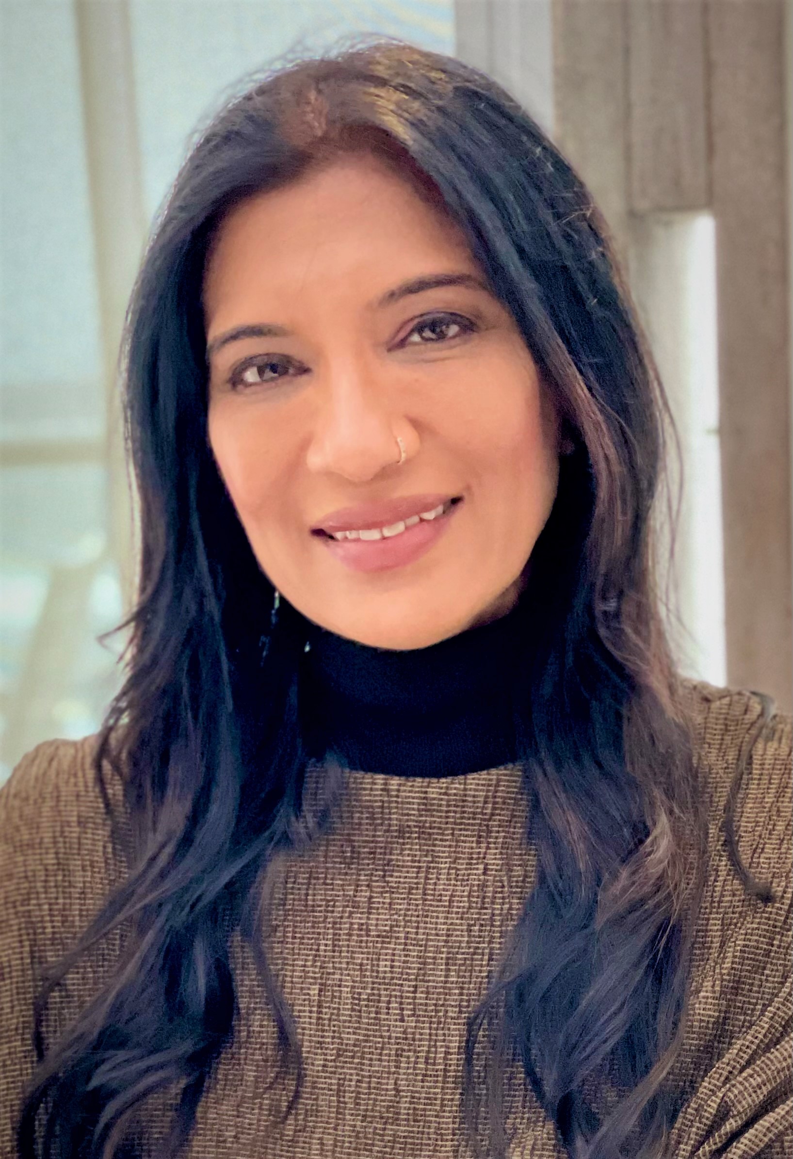 Headshot photo of Dr Reshma Sucheran